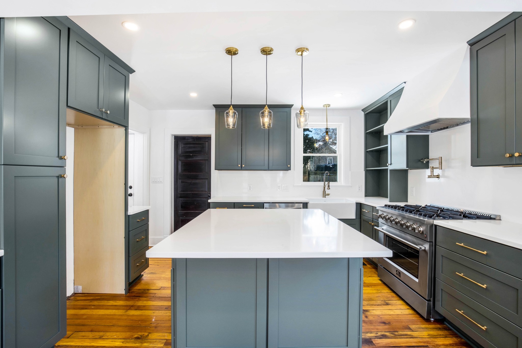 325 North Walnut Street Springfield, TN 37172 - Photo 16 of 34 a kitchen with stainless steel appliances a stove a refrigerator and a view of living room