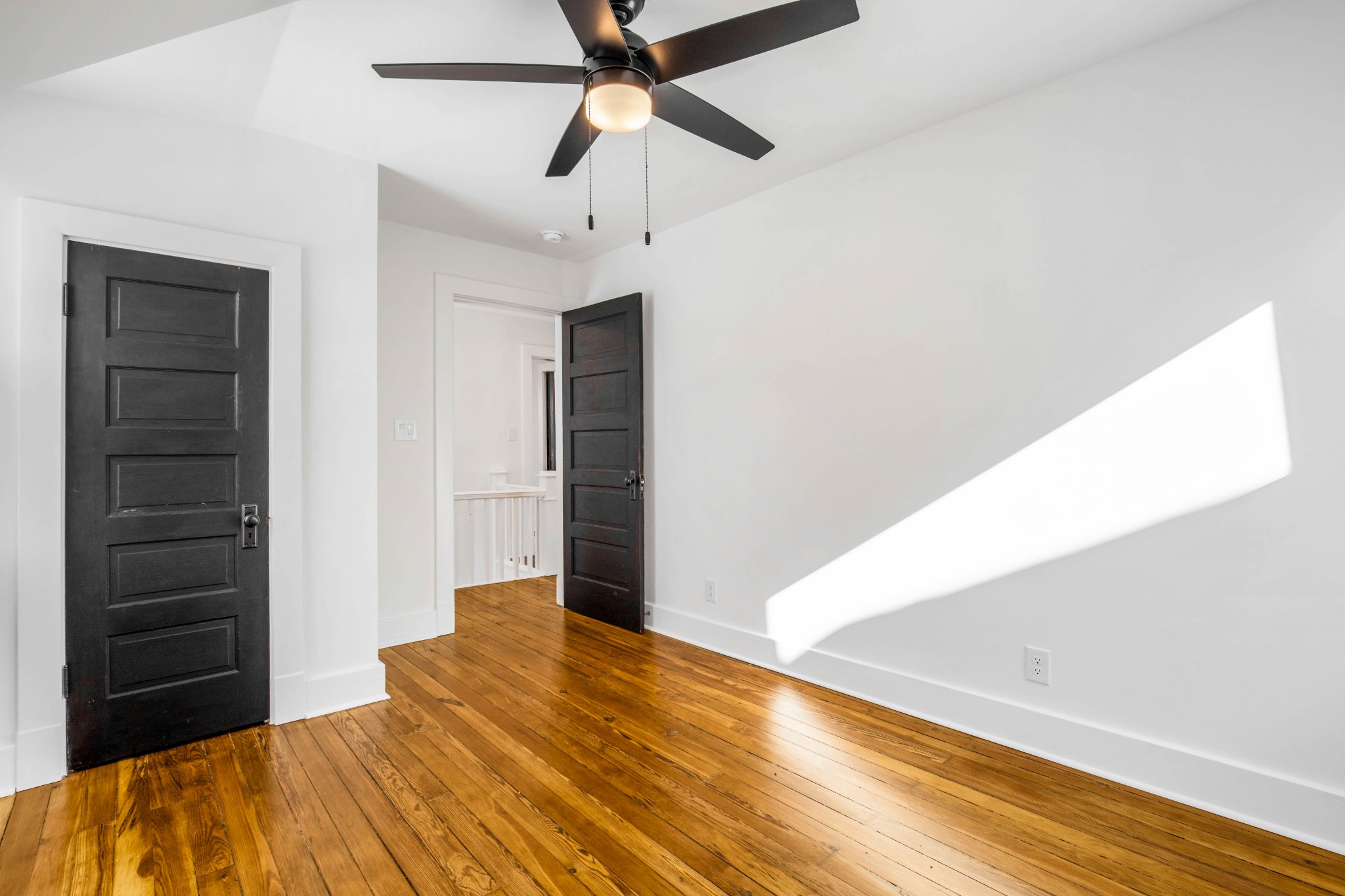 325 North Walnut Street Springfield, TN 37172 - Photo 23 of 34 a bedroom with a bed and a chandelier fan
