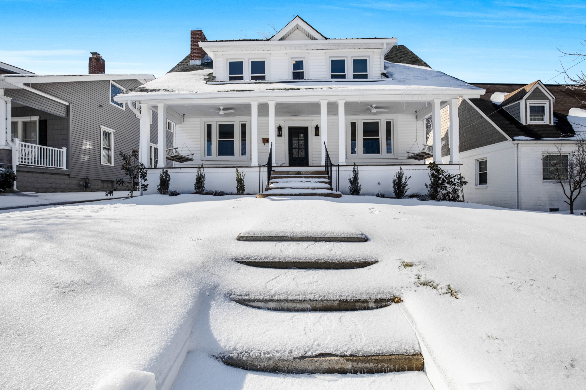 325 North Walnut Street Springfield, TN 37172 - Photo 3 of 34 a view of a white house with large windows and couches chair