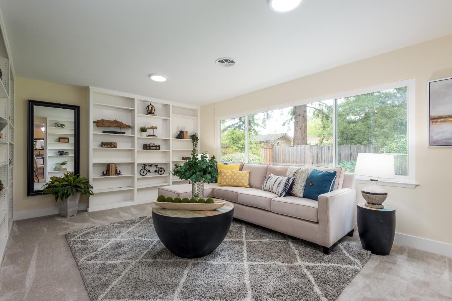 736 Filip Road Los Altos, CA 94024 - Photo 12 of 27 a living room with furniture potted plant and a large window