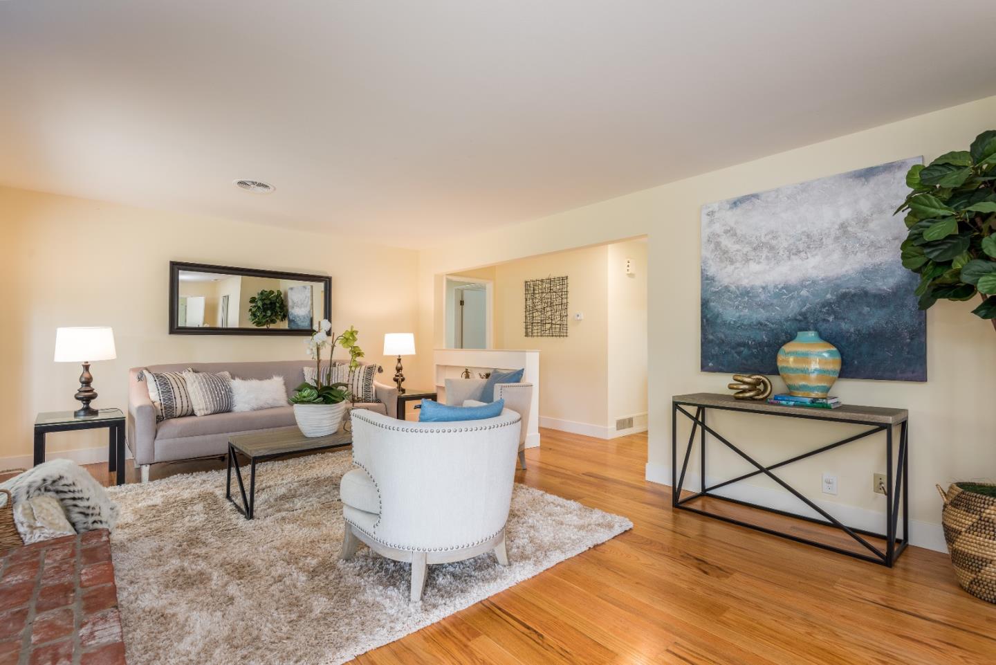 736 Filip Road Los Altos, CA 94024 - Photo 13 of 27 a living room with furniture and wooden floor