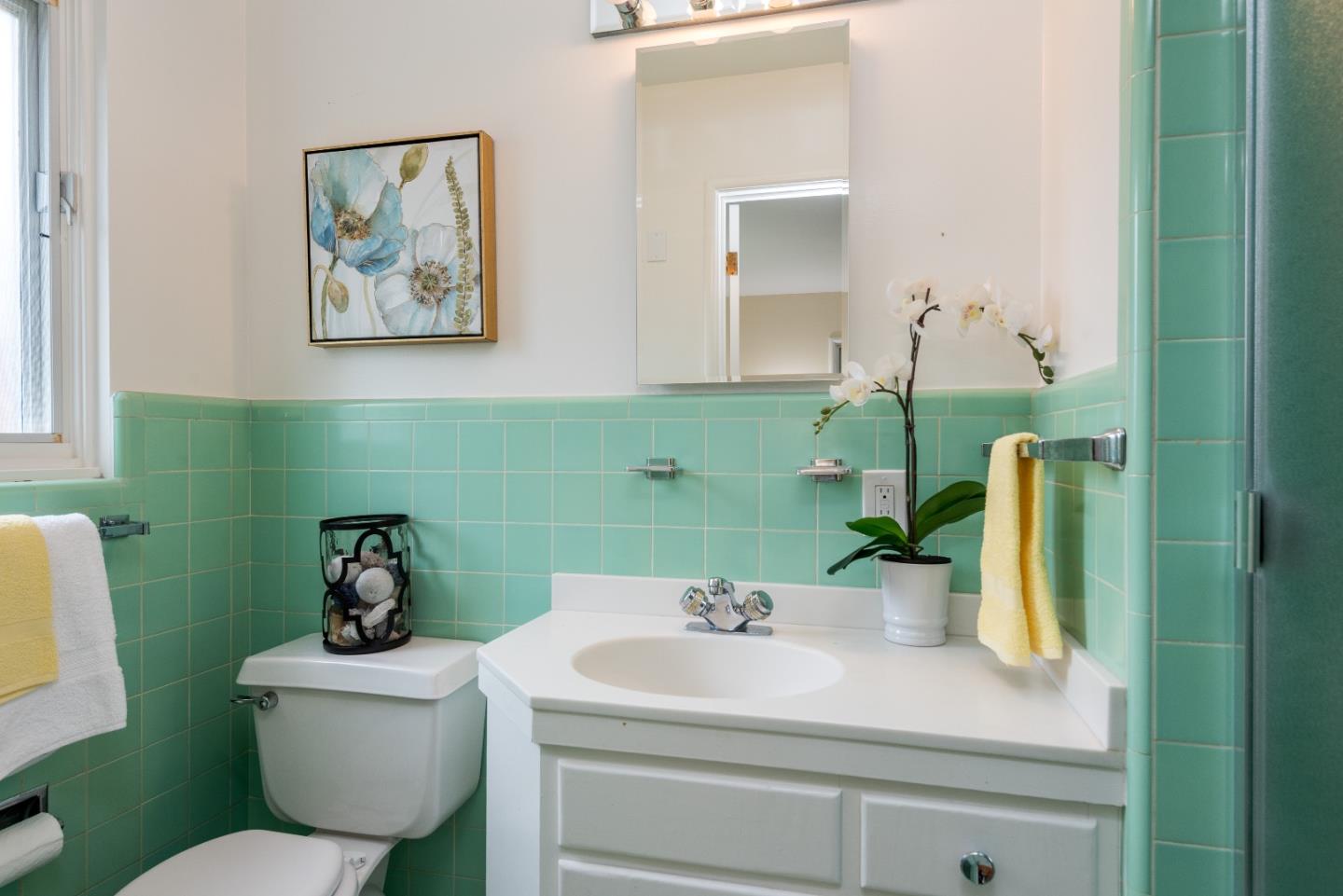 736 Filip Road Los Altos, CA 94024 - Photo 16 of 27 a bathroom with a sink mirror and toilet