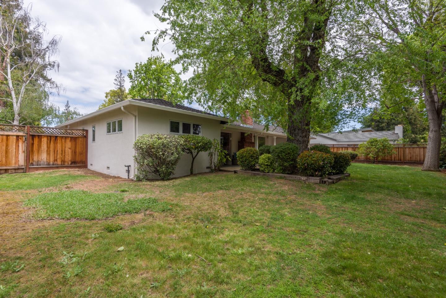 736 Filip Road Los Altos, CA 94024 - Photo 22 of 27 a white house that has a tree in front of it