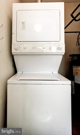 a view of kitchen with cabinets and wooden floor
