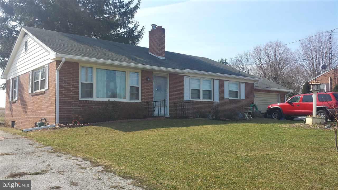 4232 Walters Hatchery Road York, PA 17408 - Photo 1 of 2 a view of a house with a patio