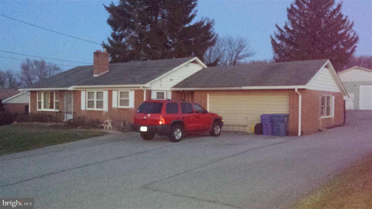 4232 Walters Hatchery Road York, PA 17408 - Photo 2 of 2 a view of a house with cars parked in front of house