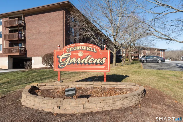 a sign board with parking space