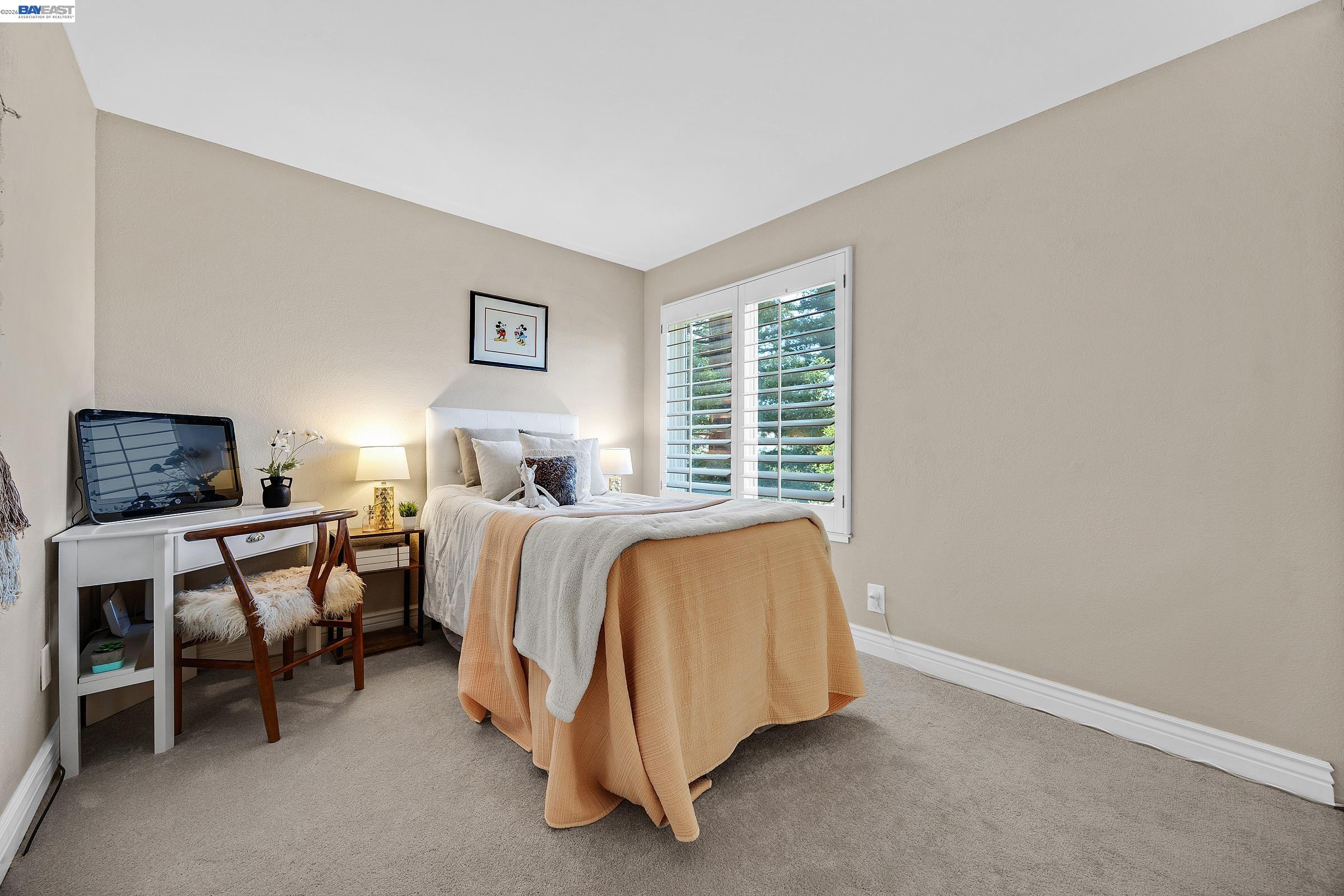 17 Suva Court San Ramon, CA 94582 - Photo 25 of 47 a bed room with a bed and a window