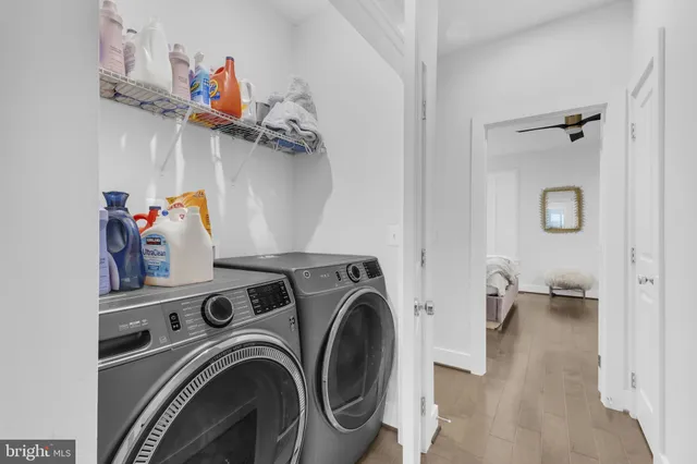 a view of storage and utility room with washer and dryer