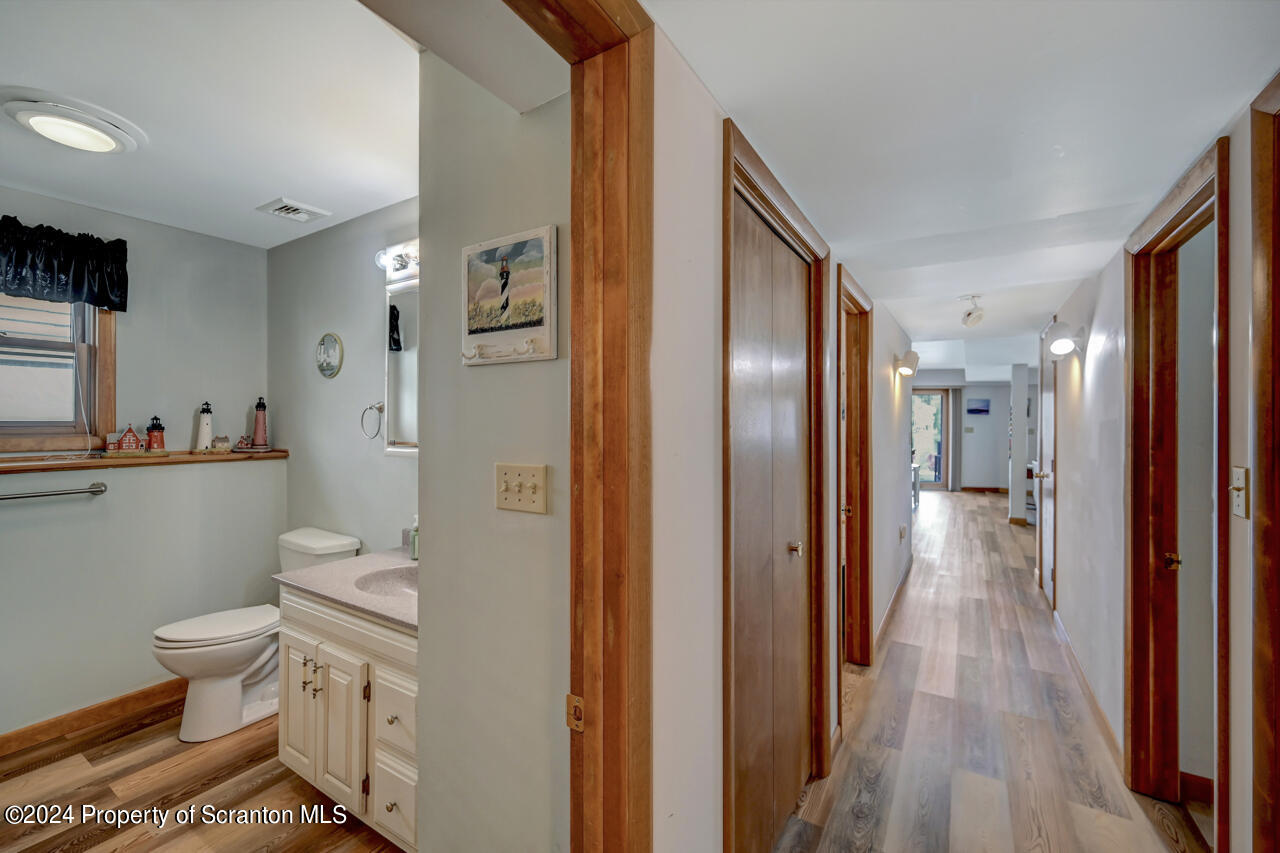 428 Point Road Lake Winola, PA 18419 - Photo 50 of 74 a bathroom with a granite countertop toilet sink and shower