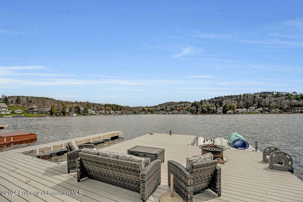 428 Point Road Lake Winola, PA 18419 - Photo 65 of 74 a view of a lake with couches chairs