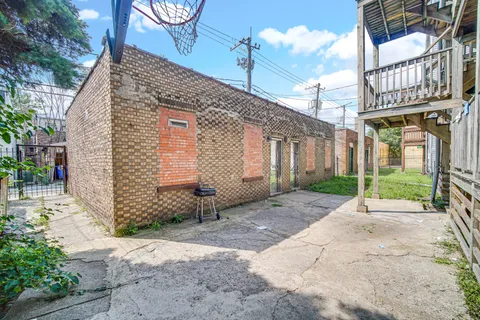 a brick building with a large windows