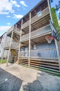 a view of front door with a deck
