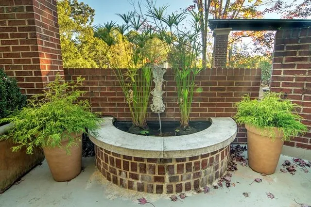a coffee table with a potted plant