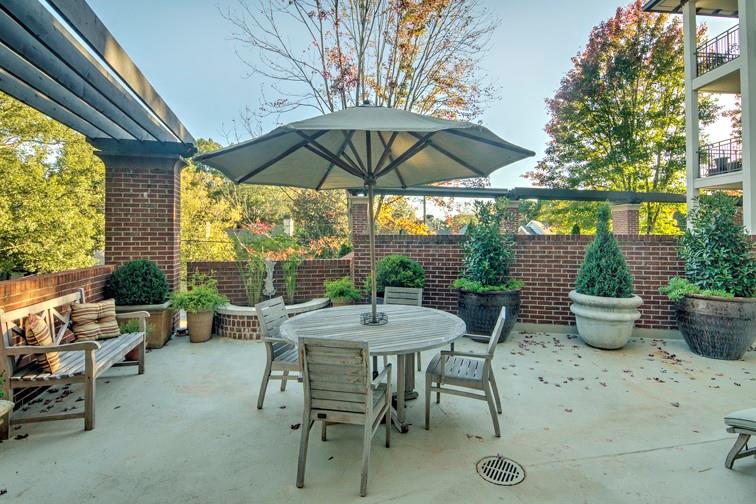 3101 Howell Mill Road Northwest, Unit 121 Atlanta, GA 30327 - Photo 24 of 40 a view of outdoor space yard and patio