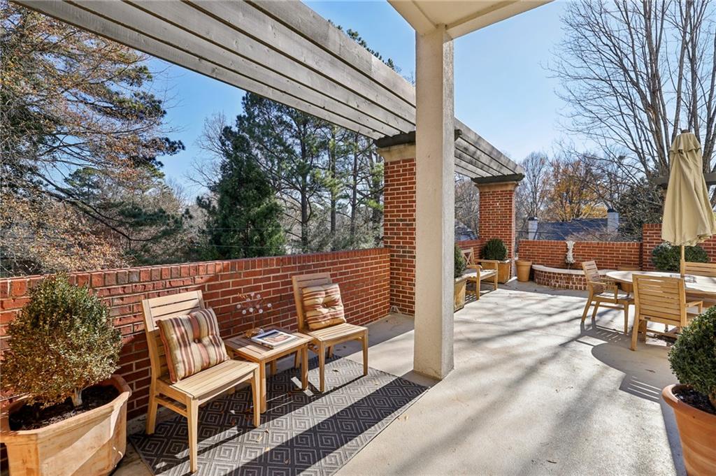 3101 Howell Mill Road Northwest, Unit 121 Atlanta, GA 30327 - Photo 26 of 40 a view of outdoor space yard and patio