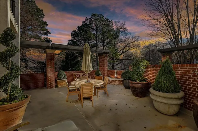 a view of a backyard with patio