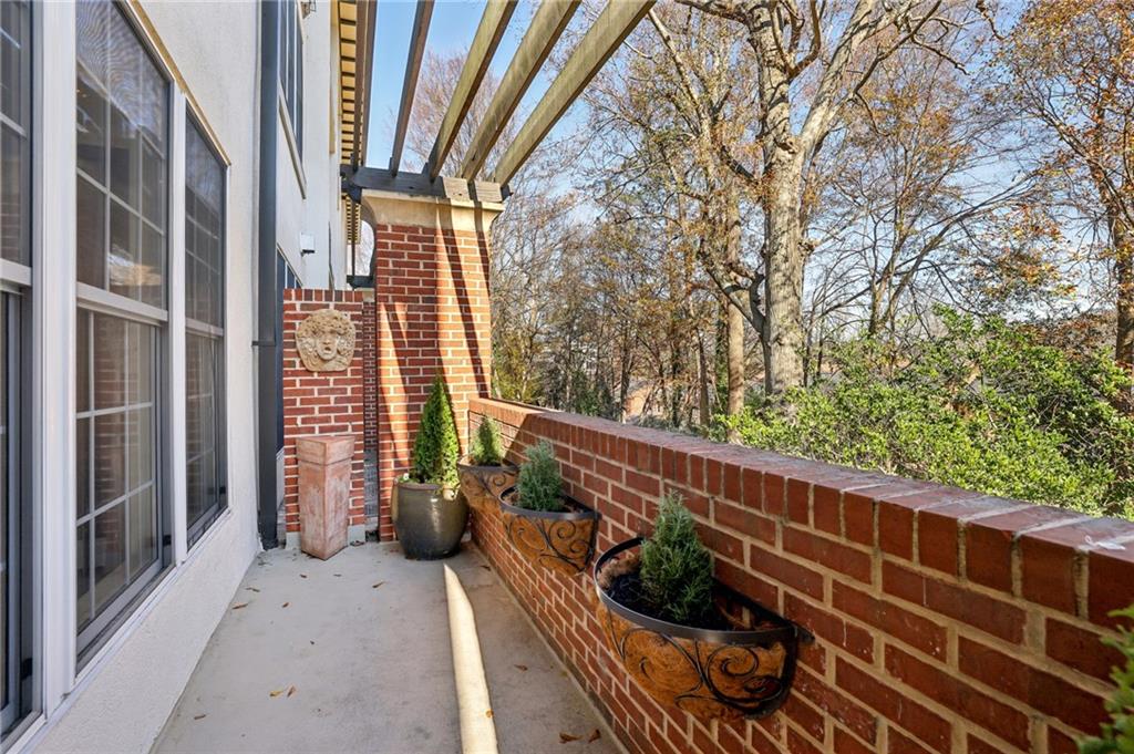 3101 Howell Mill Road Northwest, Unit 121 Atlanta, GA 30327 - Photo 31 of 38 a view of balcony with furniture