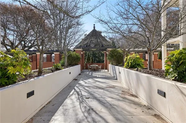 a view of a house with a small yard