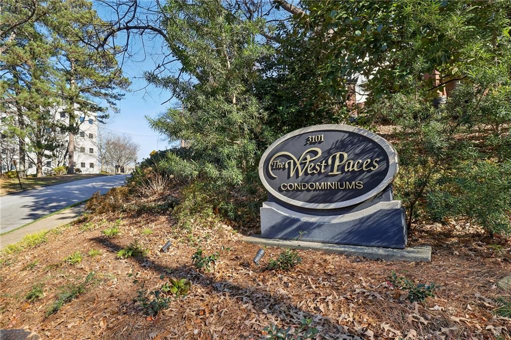 3101 Howell Mill Road Northwest, Unit 121 Atlanta, GA 30327 - Photo 38 of 40 a view of outdoor space with sign board