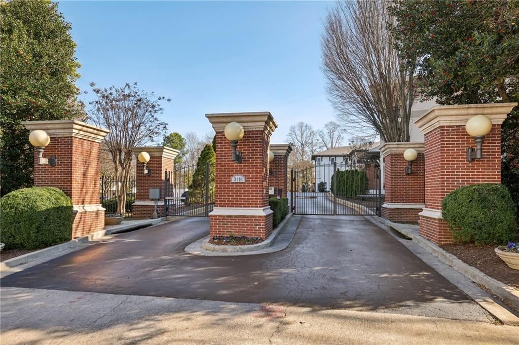 3101 Howell Mill Road Northwest, Unit 121 Atlanta, GA 30327 - Photo 39 of 40 a view of a park with plants and large trees
