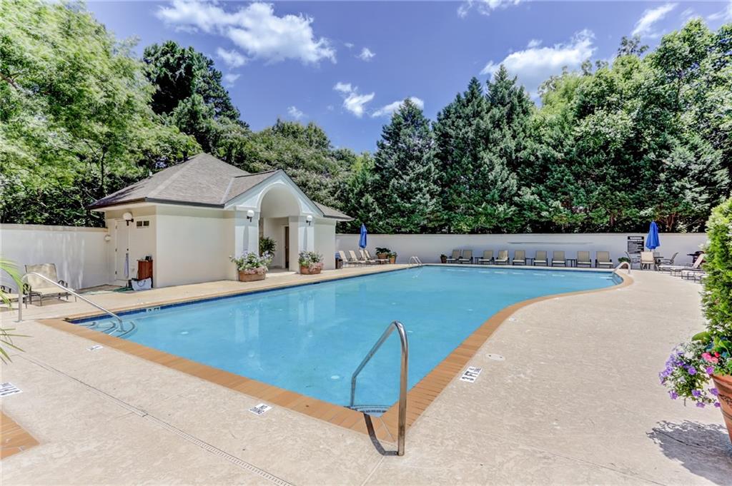 3101 Howell Mill Road Northwest, Unit 121 Atlanta, GA 30327 - Photo 40 of 40 a view of swimming pool with an outdoor space