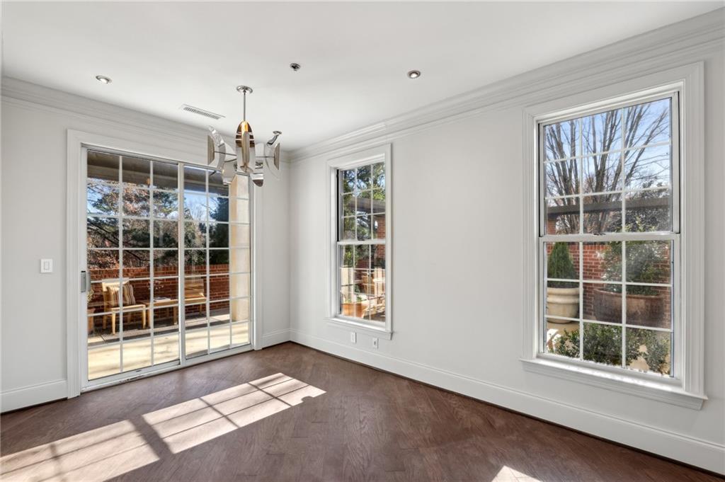 3101 Howell Mill Road Northwest, Unit 121 Atlanta, GA 30327 - Photo 8 of 38 a view of an empty room with a window