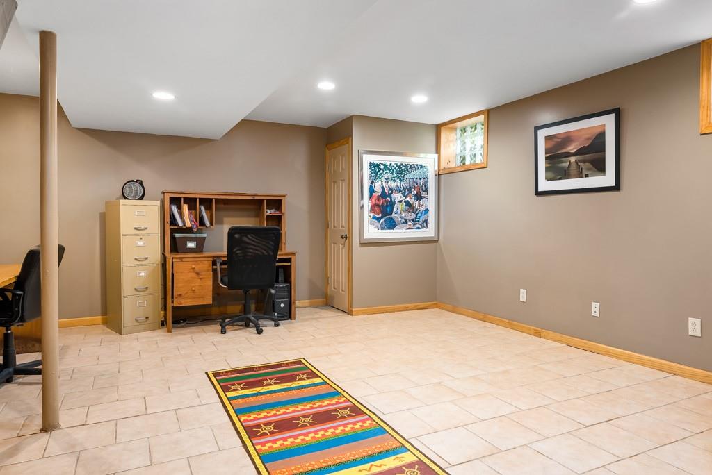 829 Rockdale Road Butler, PA 16002 - Photo 28 of 50 a room with gym equipment and a table