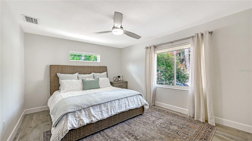 2115 Grove Street Sarasota, FL 34239 - Photo 16 of 40 a bedroom with a bed and a window