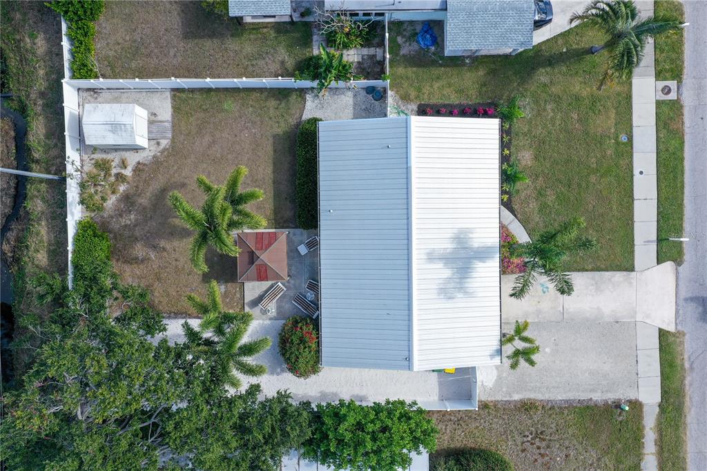 2115 Grove Street Sarasota, FL 34239 - Photo 30 of 40 an aerial view of a house with a yard and potted plants