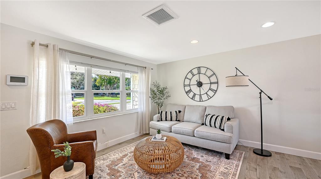 2115 Grove Street Sarasota, FL 34239 - Photo 5 of 40 a living room with furniture and a large window