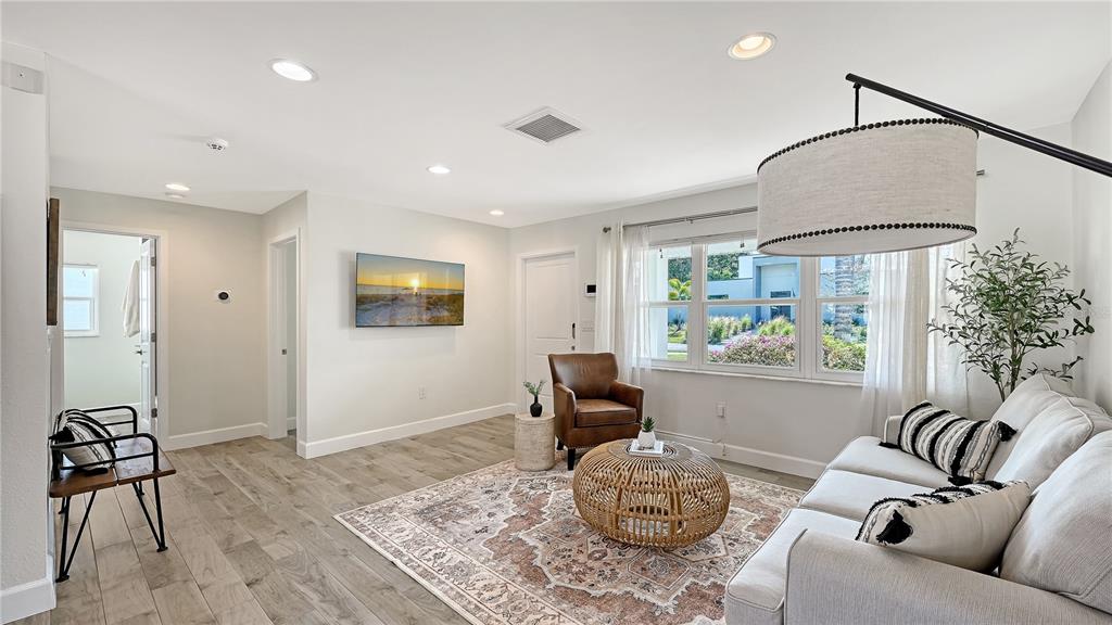 2115 Grove Street Sarasota, FL 34239 - Photo 6 of 40 a living room with furniture and a window