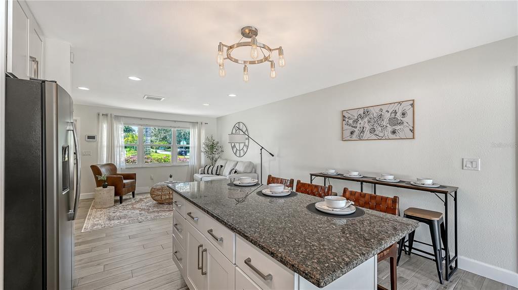2115 Grove Street Sarasota, FL 34239 - Photo 9 of 40 a kitchen with sink cabinets and appliances
