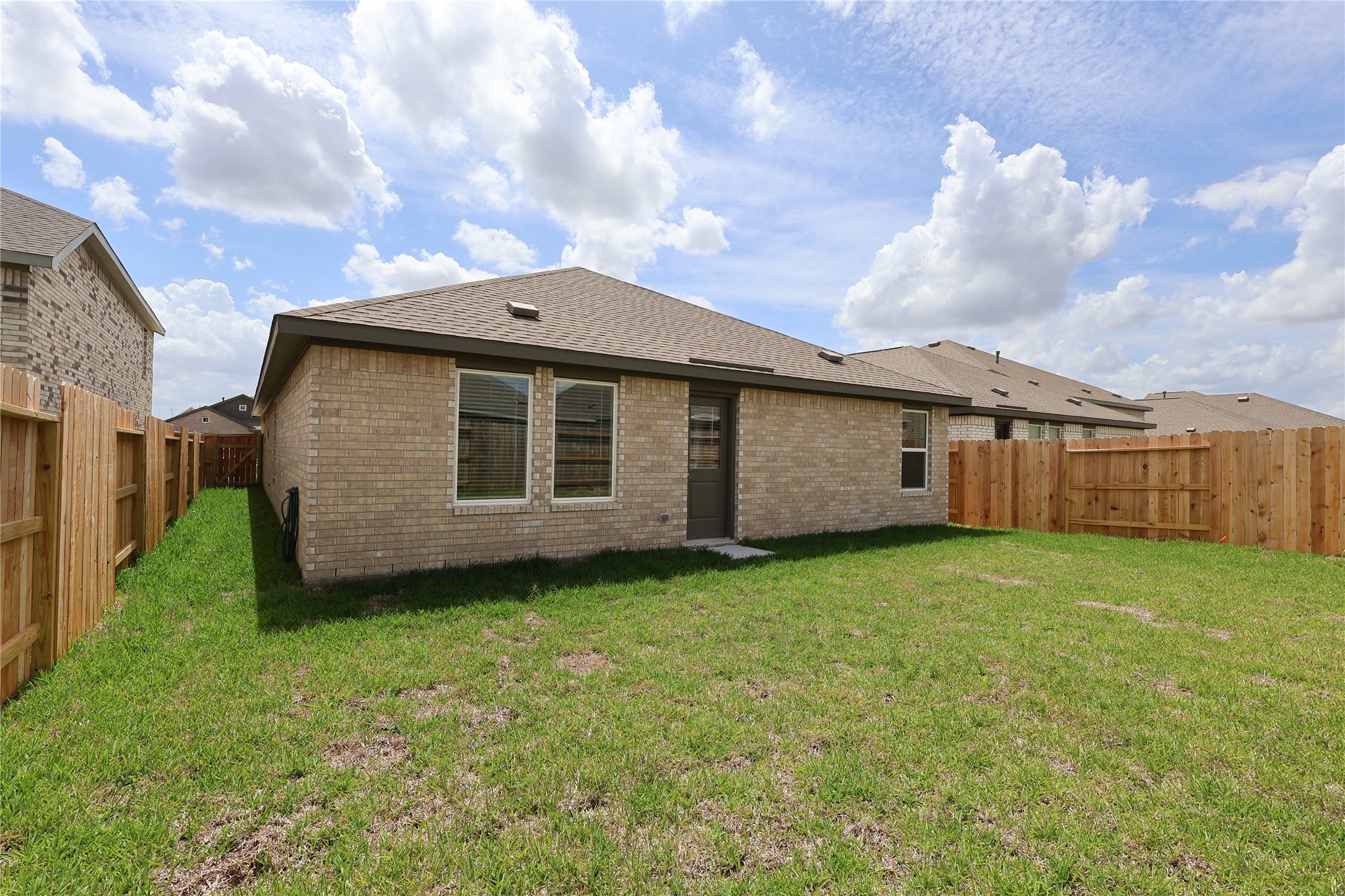 3020 Colusa Rdg Drive Katy, TX 77493 - Photo 15 of 16 a backyard of a house with lots of green space