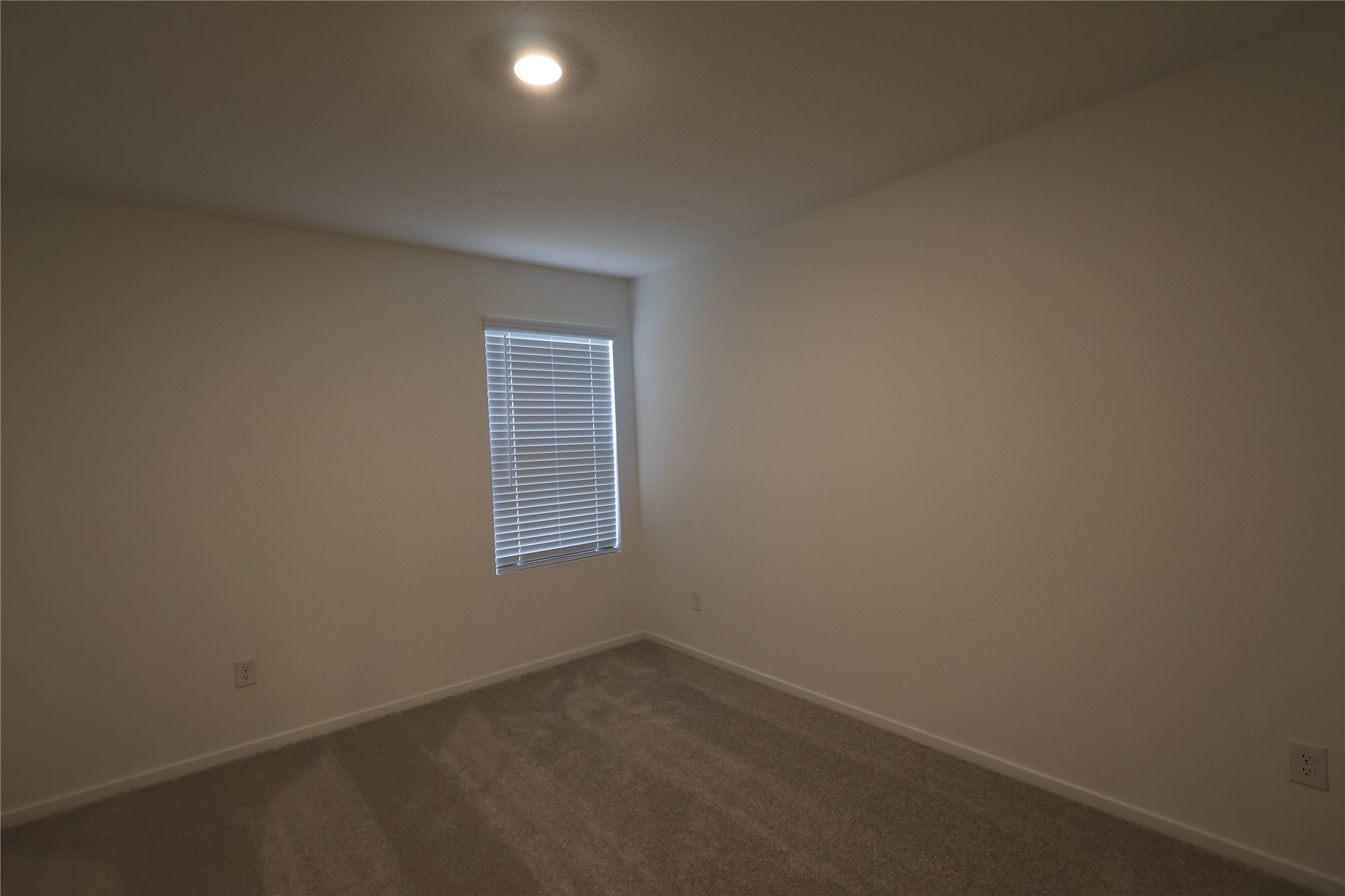 3020 Colusa Rdg Drive Katy, TX 77493 - Photo 7 of 16 an empty room with a window