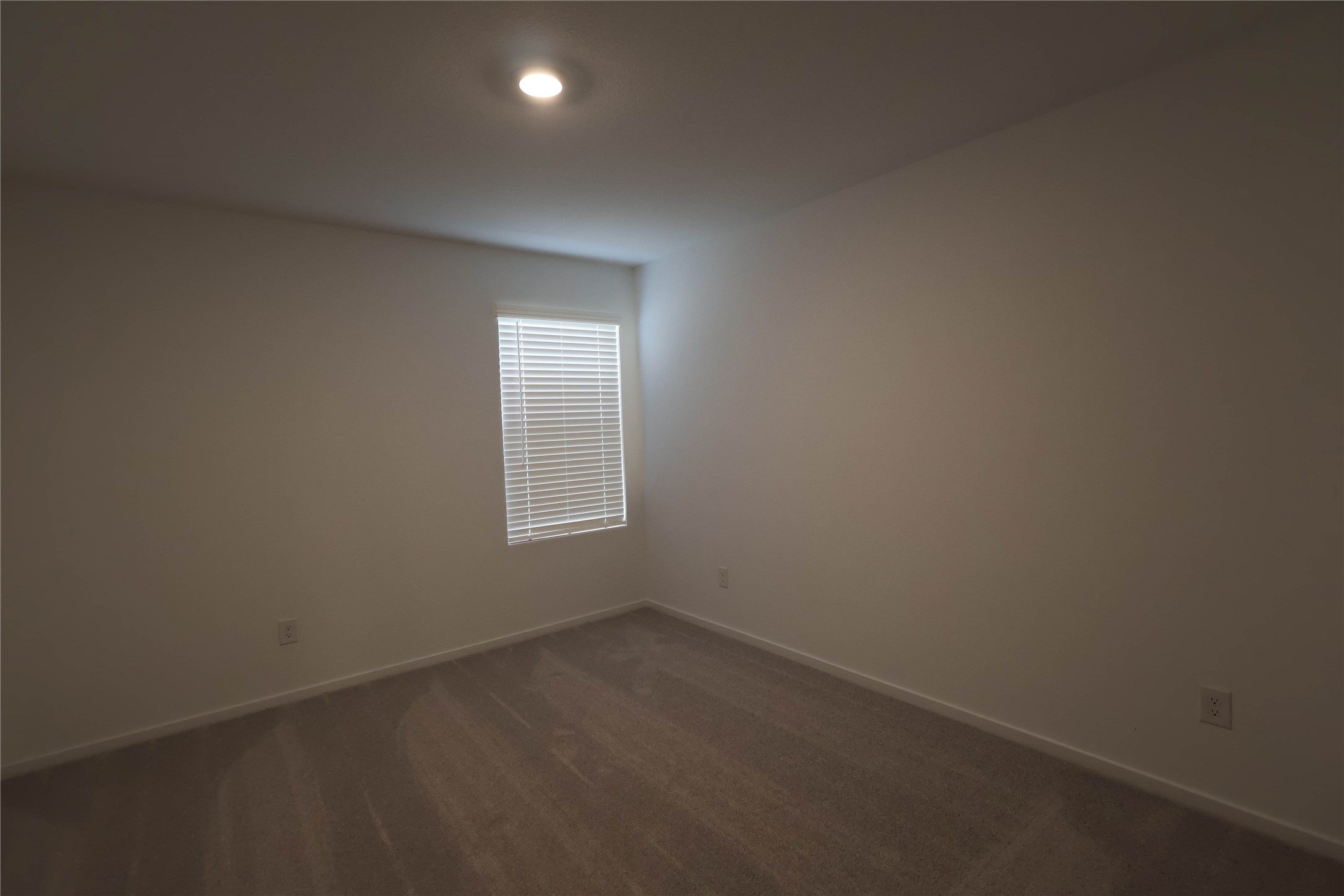 3020 Colusa Rdg Drive Katy, TX 77493 - Photo 8 of 16 an empty room with a empty space and window