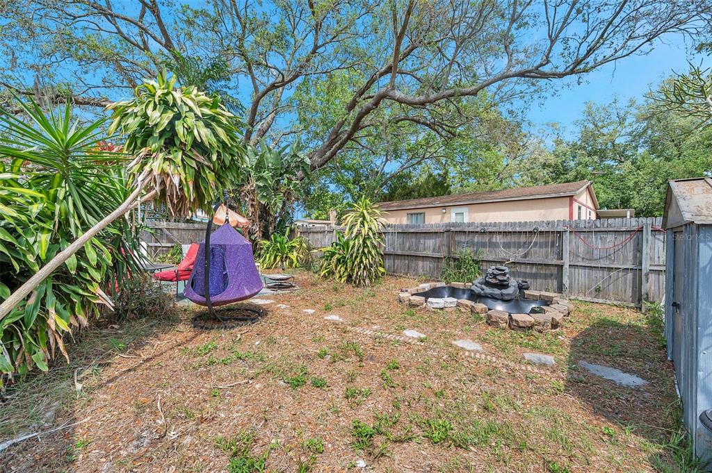 8844 Mike Street Port Richey, FL 34668 - Photo 12 of 51 a view of an outdoor space with a patio