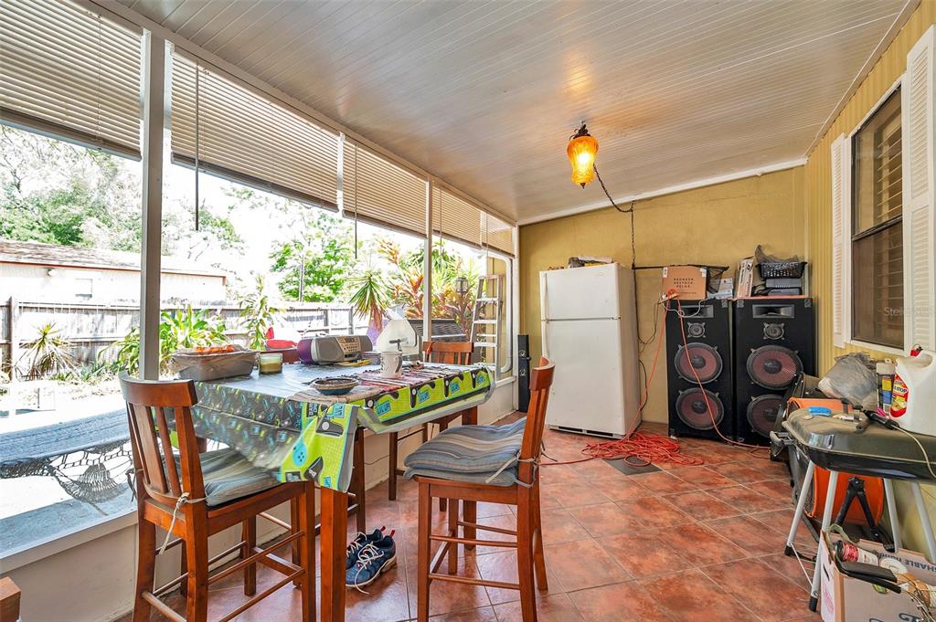 8844 Mike Street Port Richey, FL 34668 - Photo 14 of 51 a view of a dining room with furniture window and outside view