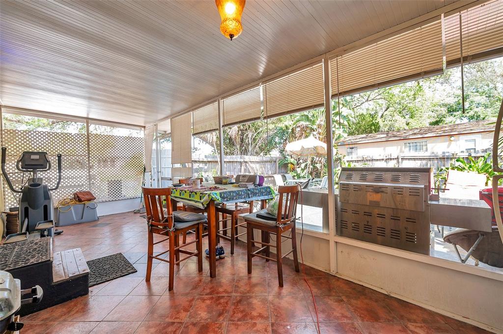 8844 Mike Street Port Richey, FL 34668 - Photo 15 of 51 a view of a dining room with furniture window and outside view
