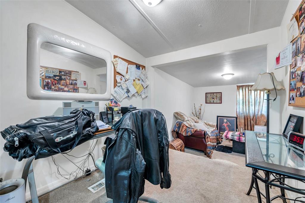 8844 Mike Street Port Richey, FL 34668 - Photo 30 of 51 a view of a room with gym equipment