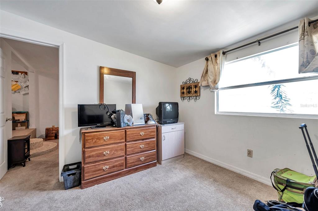 8844 Mike Street Port Richey, FL 34668 - Photo 34 of 51 a room with furniture and window