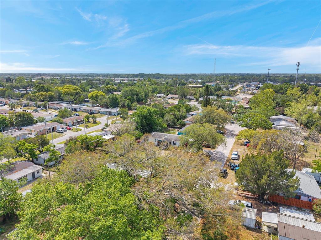8844 Mike Street Port Richey, FL 34668 - Photo 37 of 51 an aerial view of a city with lots of residential buildings