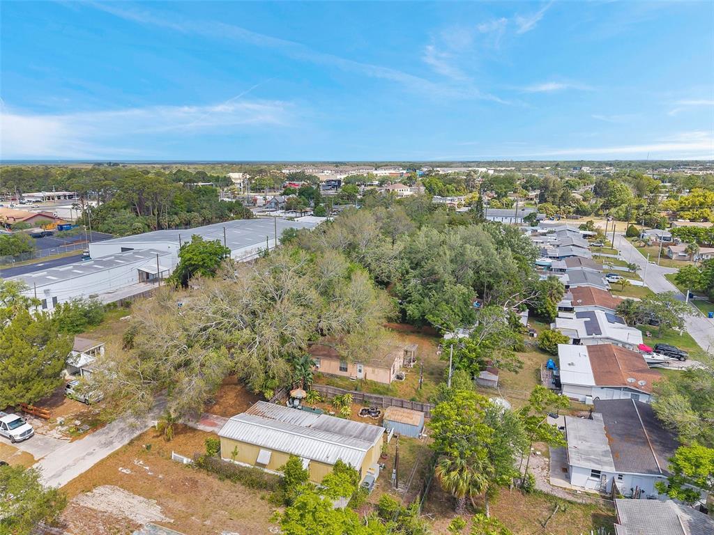 8844 Mike Street Port Richey, FL 34668 - Photo 41 of 51 an aerial view of a house with a yard