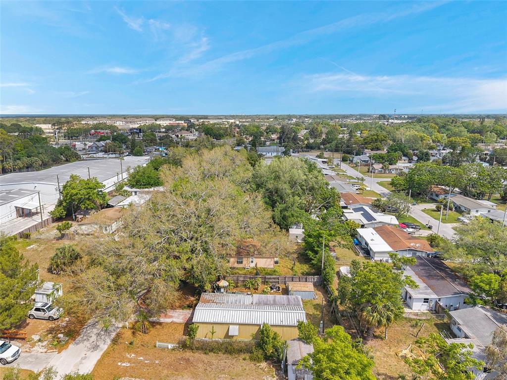 8844 Mike Street Port Richey, FL 34668 - Photo 42 of 51 an aerial view of a house with a yard