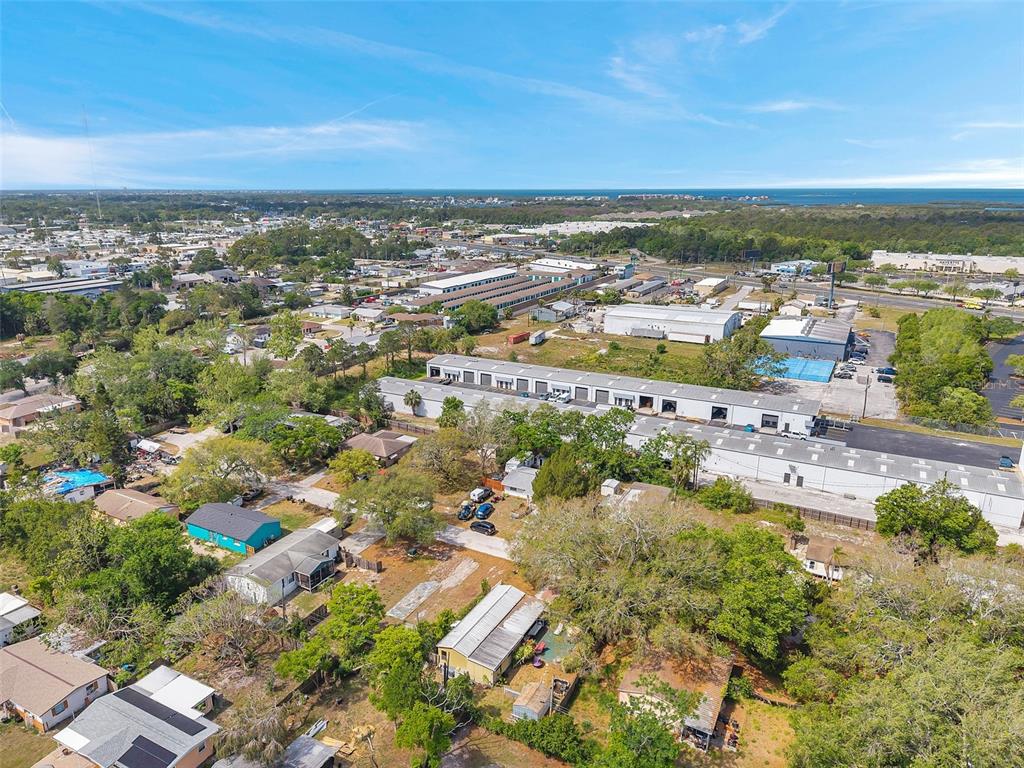 8844 Mike Street Port Richey, FL 34668 - Photo 47 of 51 an aerial view of residential building and lake