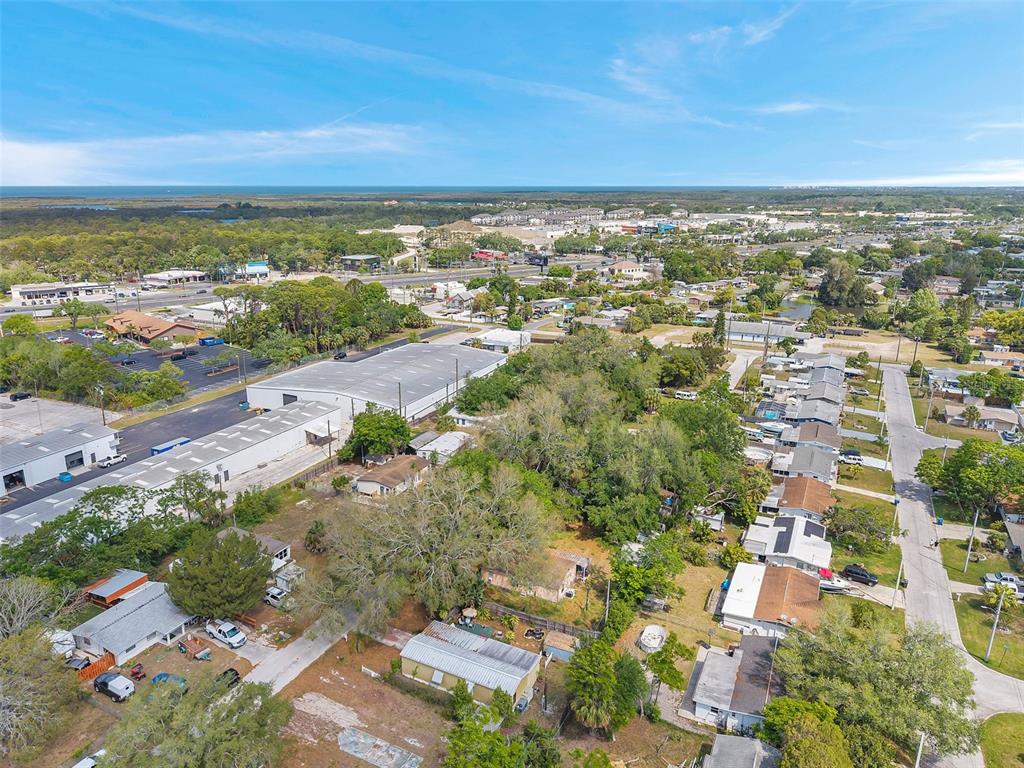 8844 Mike Street Port Richey, FL 34668 - Photo 49 of 51 an aerial view of residential building and green space