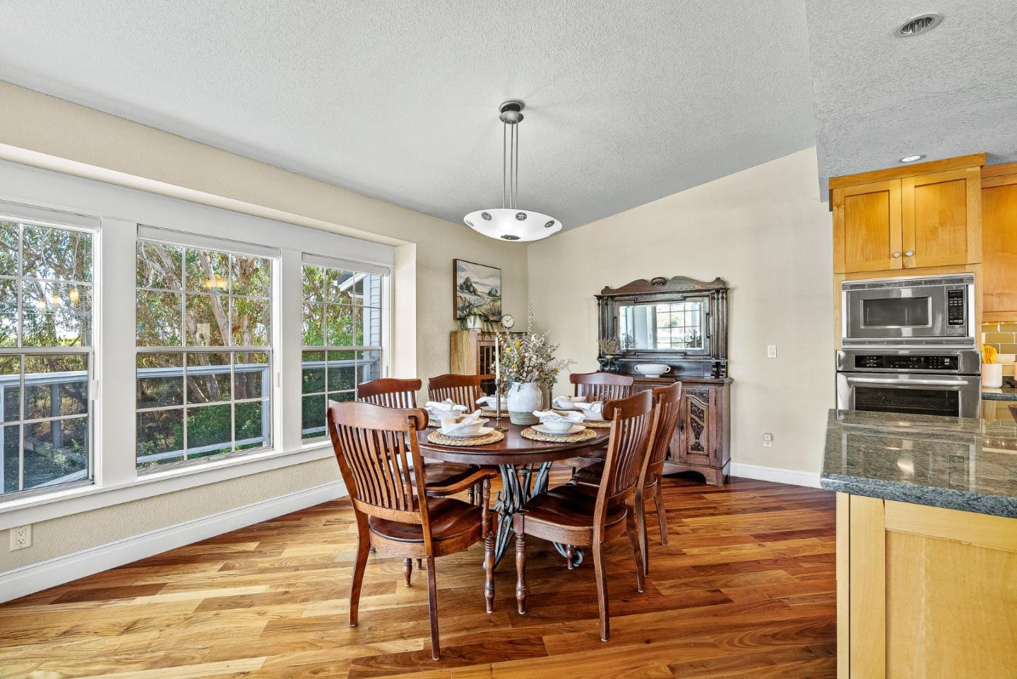 431 Canon Del Sol Watsonville, CA 95076 - Photo 13 of 50 a dining room with furniture window wooden floor
