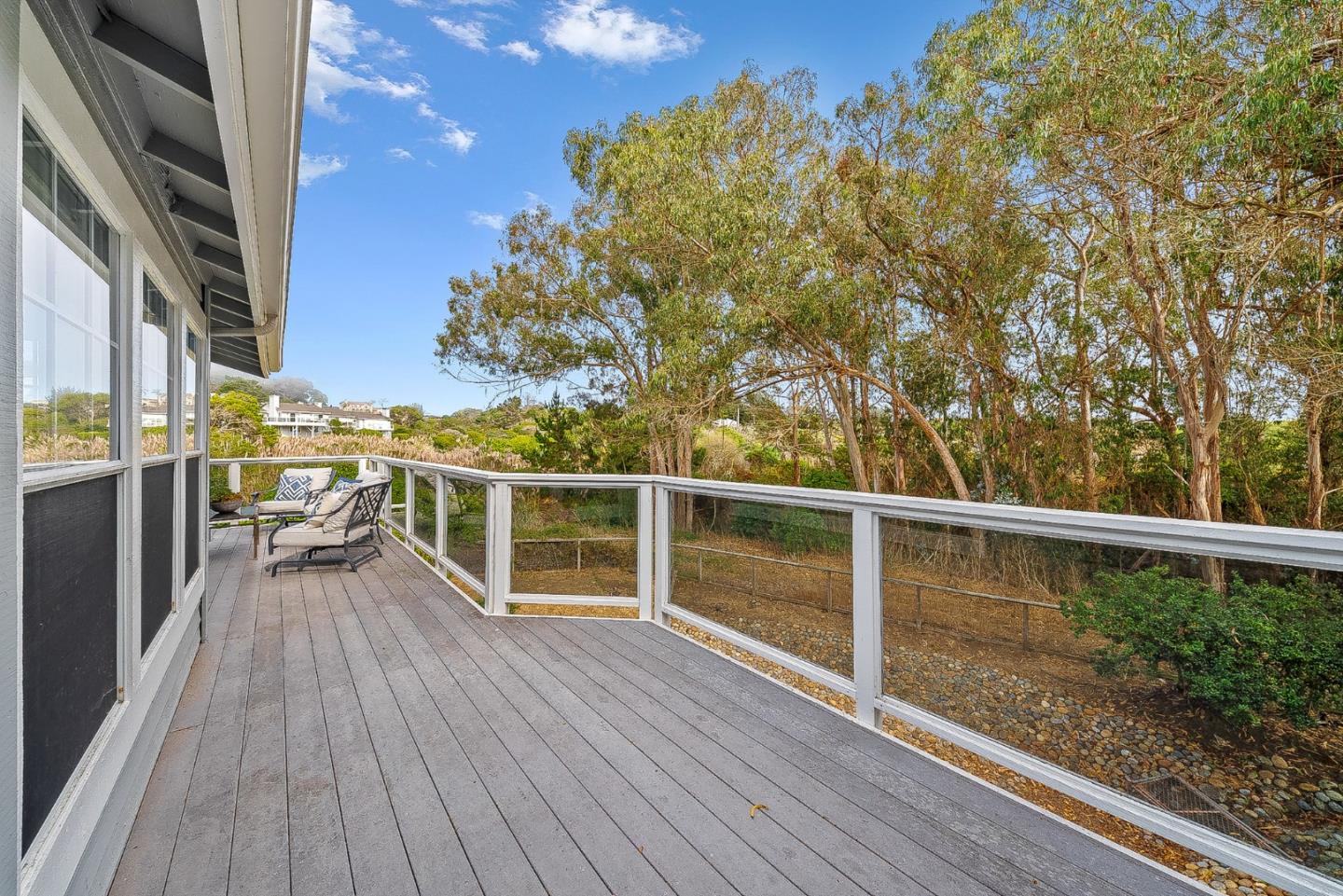 431 Canon Del Sol Watsonville, CA 95076 - Photo 20 of 50 a view of a balcony with wooden floor and fence