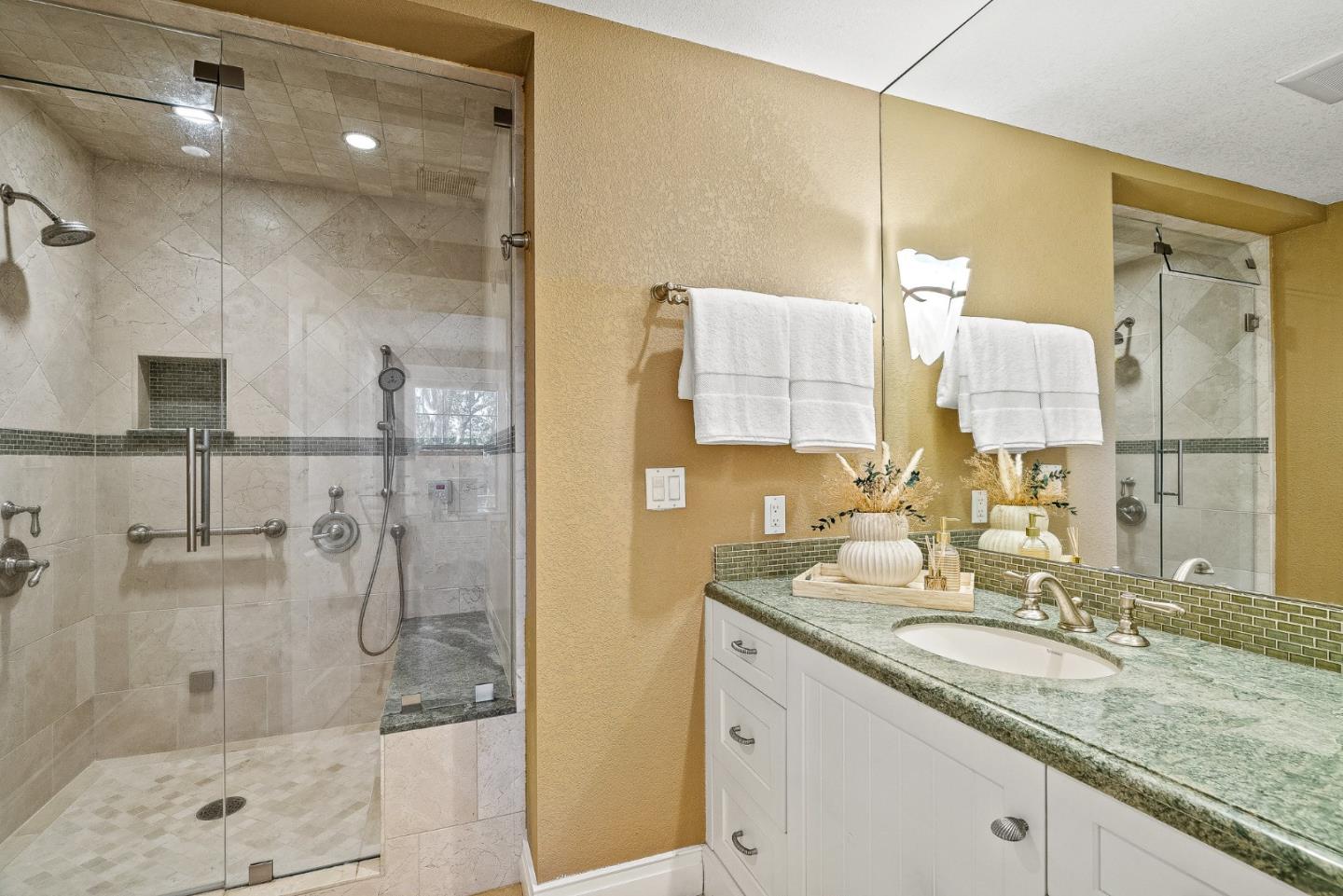 431 Canon Del Sol Watsonville, CA 95076 - Photo 26 of 50 a bathroom with a shower sink and mirror