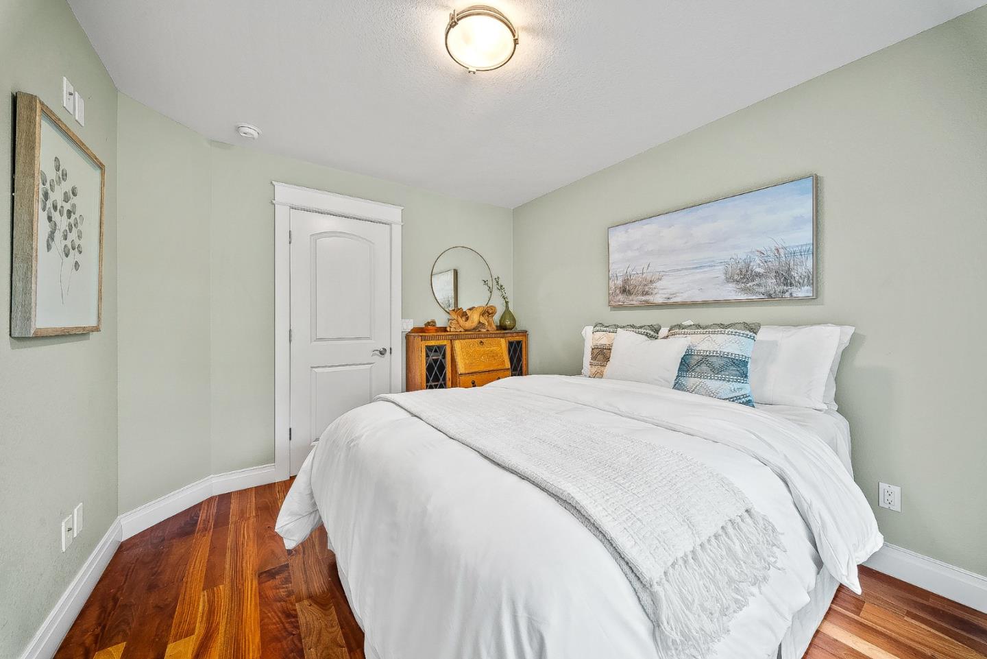 431 Canon Del Sol Watsonville, CA 95076 - Photo 34 of 50 a bedroom with bed and wooden floor